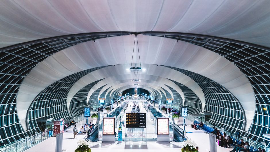 Traveler purchasing a SIM card at Kuwait International Airport