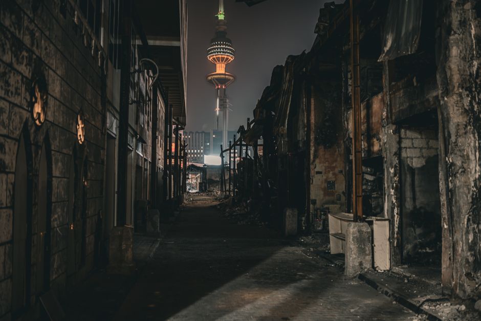 Kuwait City skyline at sunset, symbolizing safe and worry-free travel with insurance