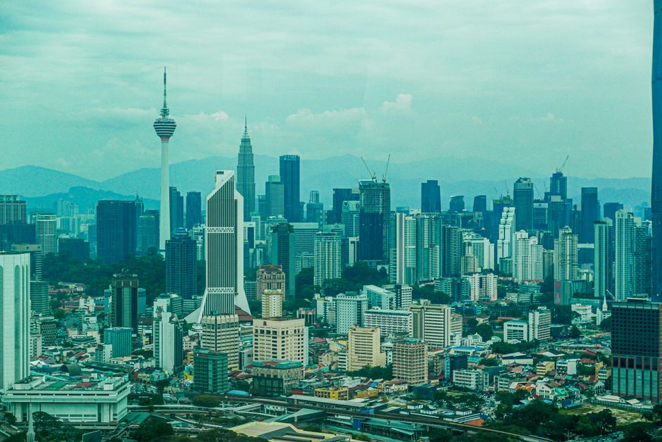 Kuala Lumpur skyline at dusk with luxury hotels in Malaysia