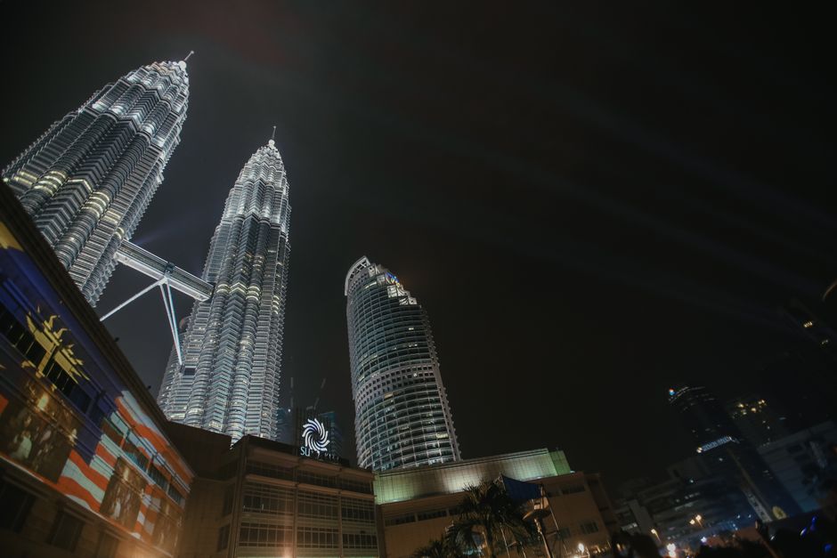 Petronas Twin Towers illuminated at night in Kuala Lumpur, Malaysia
