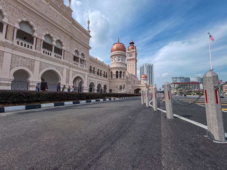 Traveler navigating Kuala Lumpur, Malaysia with a smartphone map