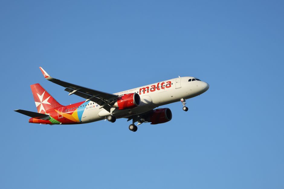 Traveler buying a SIM card at Malta International Airport