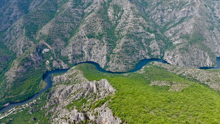 Stunning view of Matka Canyon in North Macedonia with turquoise water and lush cliffs