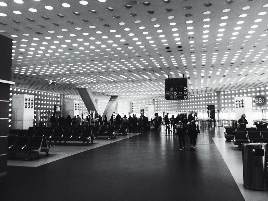 Traveler buying a SIM card at Skopje International Airport, North Macedonia