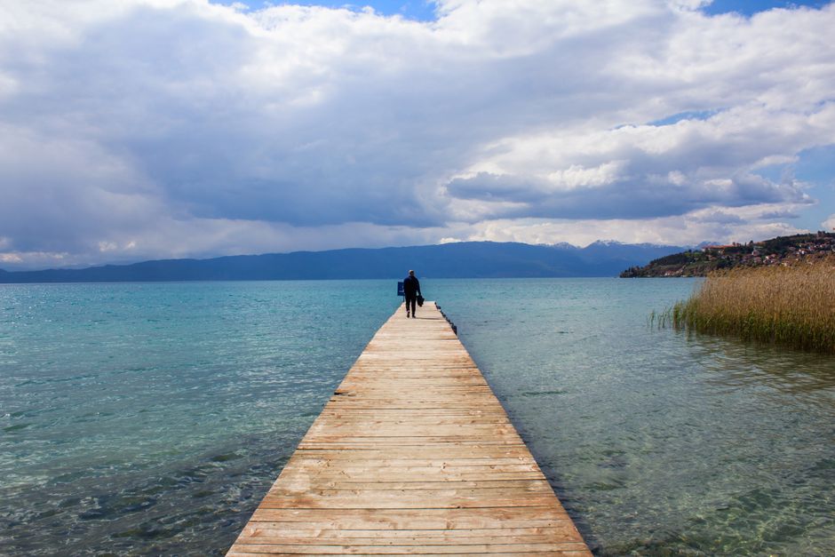 Panoramic view of Lake Ohrid with historical buildings and mountains in North Macedonia