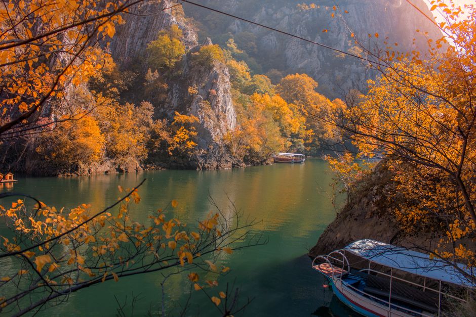 Hikers enjoying the stunning Matka Canyon in North Macedonia, emphasizing the importance of travel insurance for active trips.
