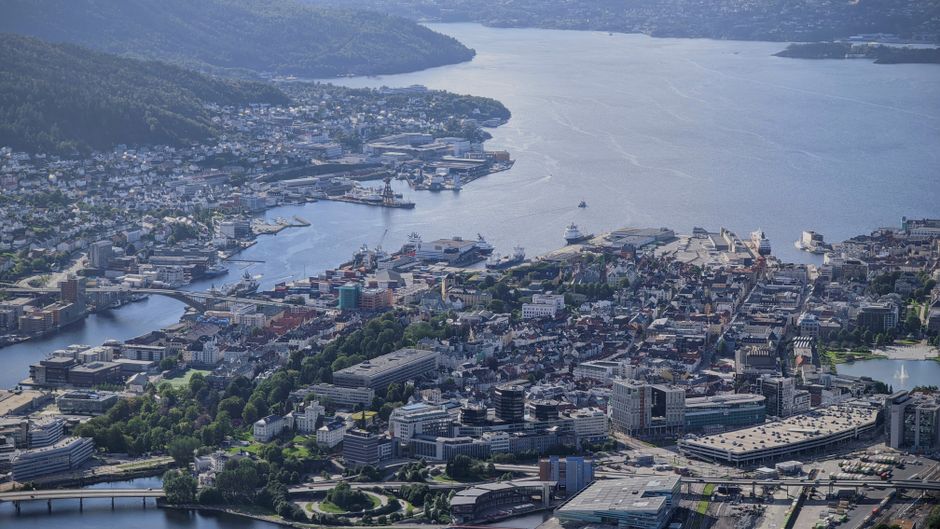 Scenic fjord cruise in Norway with majestic mountains and calm water
