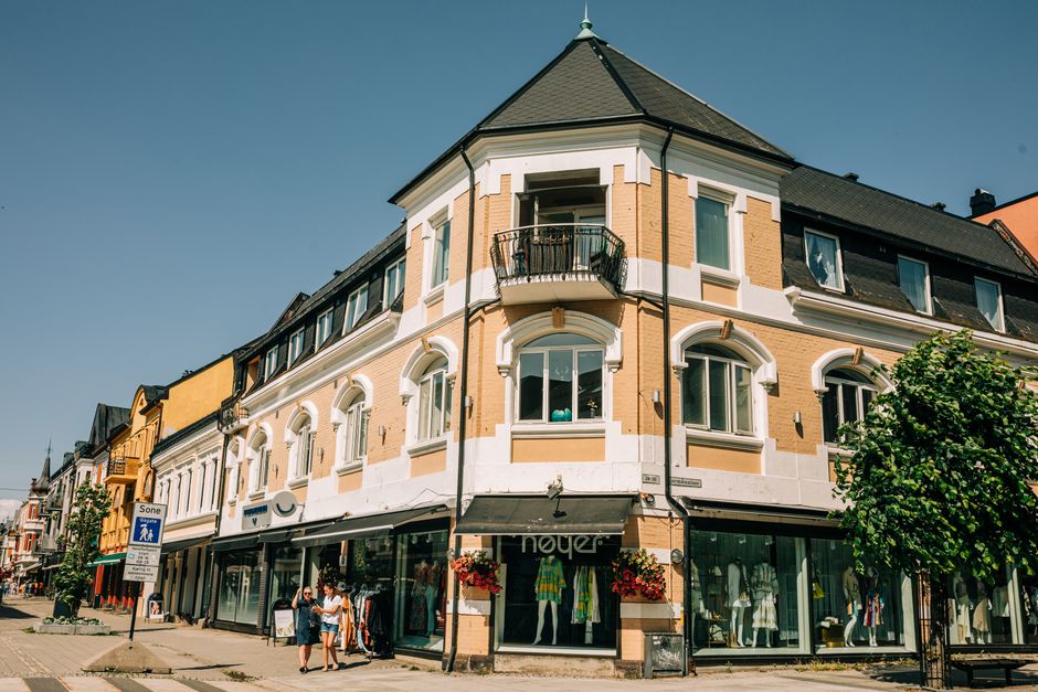 Vibrant shopping street in Oslo, Norway, with people browsing