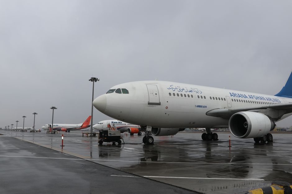Oman Air aircraft at Muscat International Airport runway