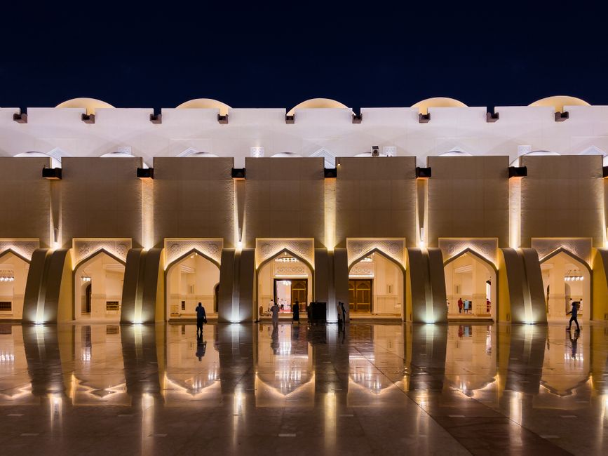 Stunning architecture of the Museum of Islamic Art in Doha, Qatar, reflecting in the water.