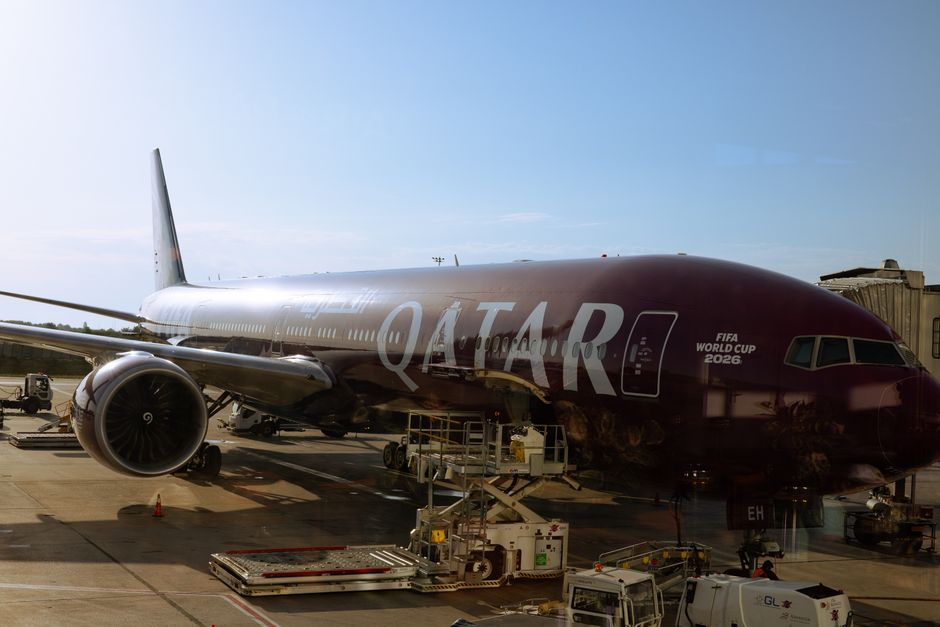Traveler purchasing a tourist SIM card at Hamad International Airport in Qatar