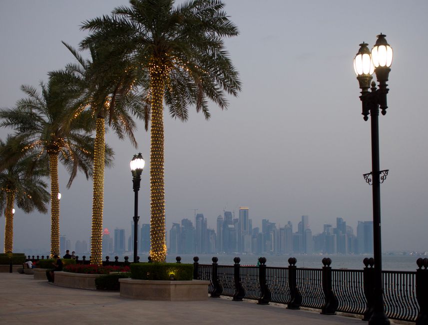 Doha skyline at sunset, showcasing modern architecture and a safe, welcoming atmosphere in Qatar