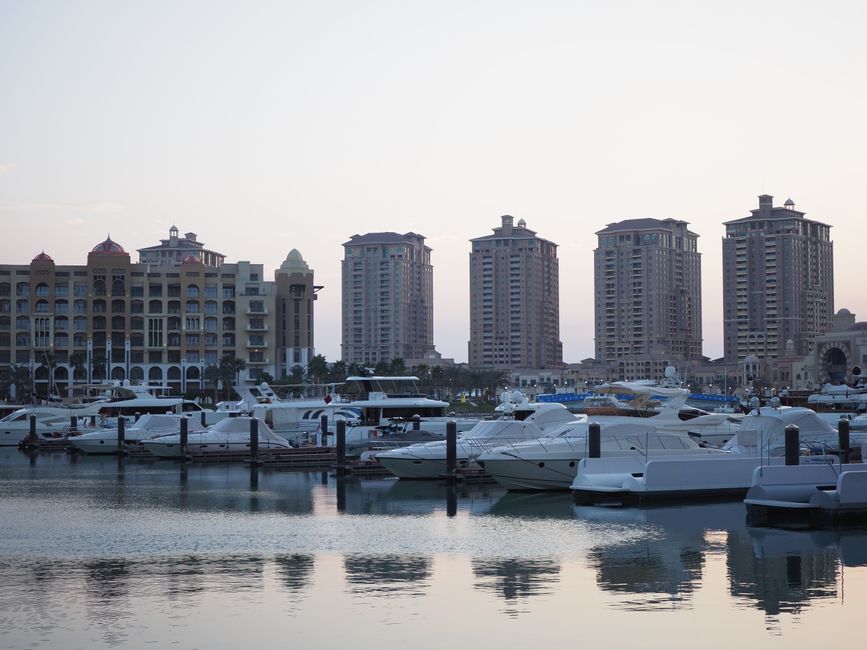 Modern Doha skyline at sunset, symbolizing safe and exciting travel to Qatar