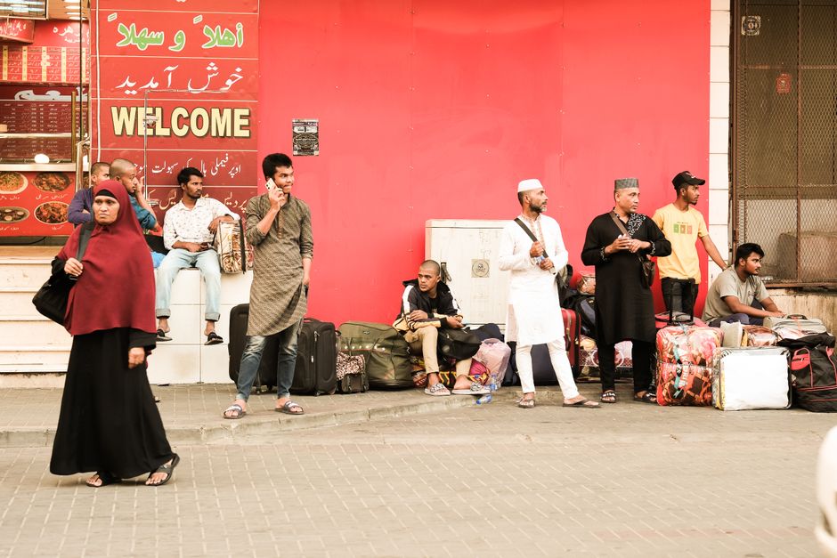 A vibrant traditional souk in Saudi Arabia with local goods and shoppers.