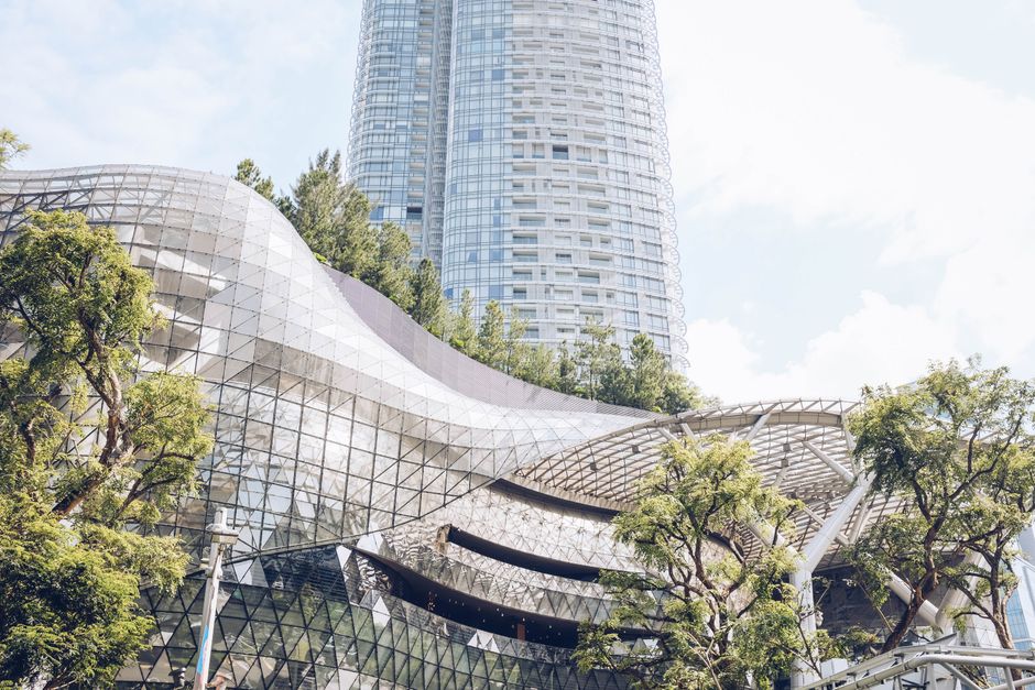 Exterior view of ION Orchard shopping mall on Orchard Road, Singapore, bustling with shoppers