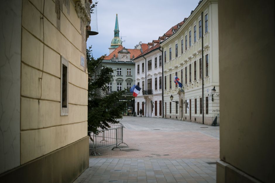 Charming Old Town square in Bratislava, Slovakia, bustling with visitors