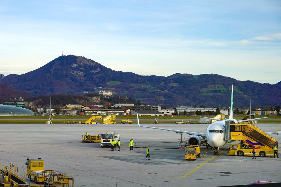 Modern terminal building of Bratislava Airport in Slovakia with planes on the tarmac.
