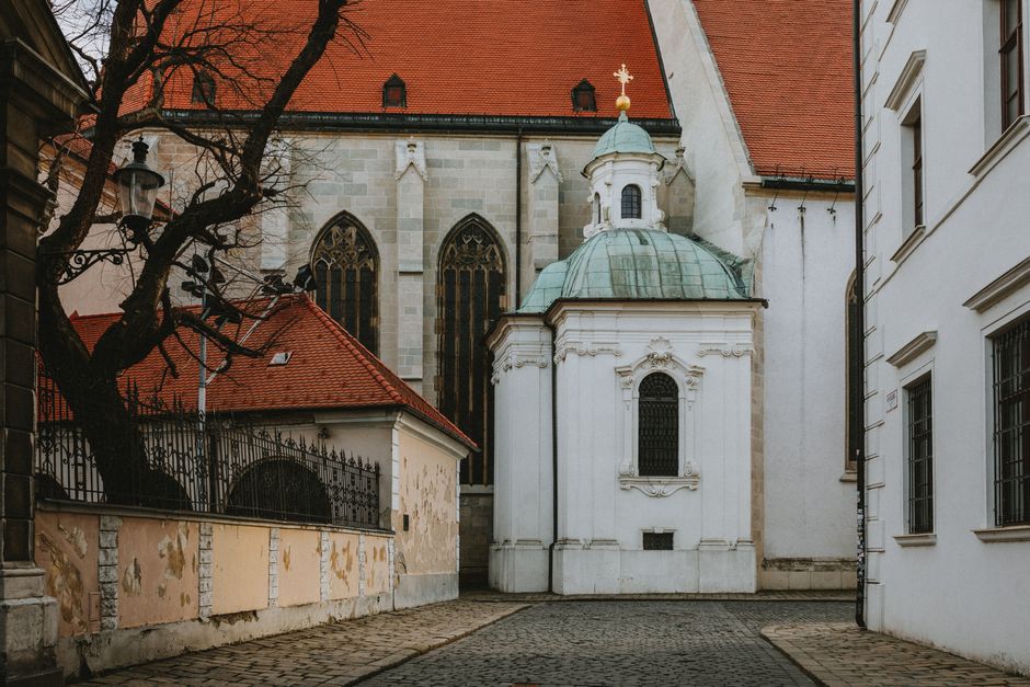 Charming street in Bratislava Old Town, Slovakia, with historic buildings and cafes