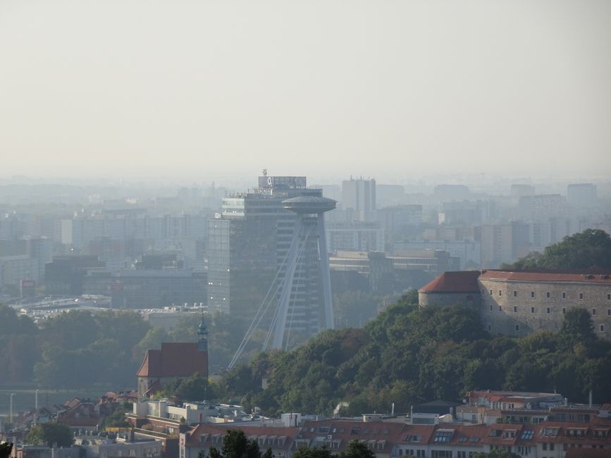 Tourist holding a map of Bratislava, Slovakia, planning their route