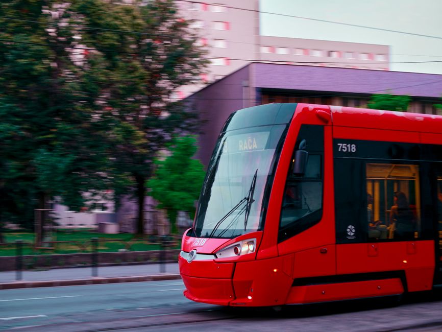 A modern tram in Bratislava, Slovakia, moving through the city center, representing efficient public transport.