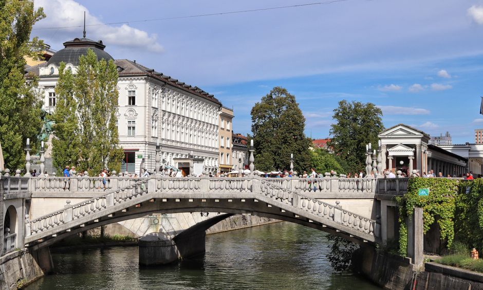 Panoramic view of Ljubljana, Slovenia, with historic buildings and the Ljubljanica River