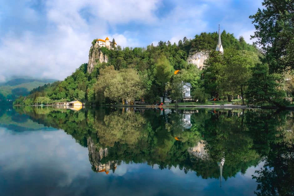 Scenic view of Lake Bled with island church and castle in Slovenia