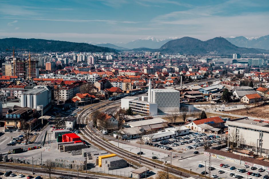 Ljubljana Jože Pučnik Airport terminal building in Slovenia with mountains in the background