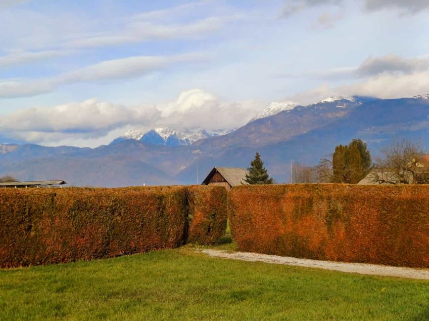 Diverse landscape of Slovenia showcasing varied weather conditions across regions