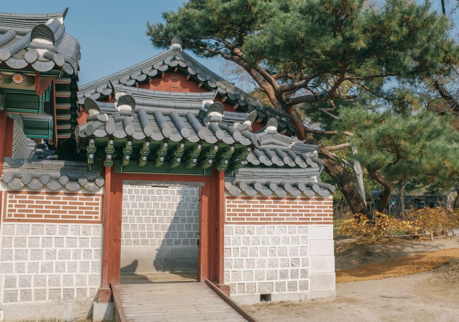 Gyeongbokgung Palace in Seoul, South Korea with traditional architecture and visitors