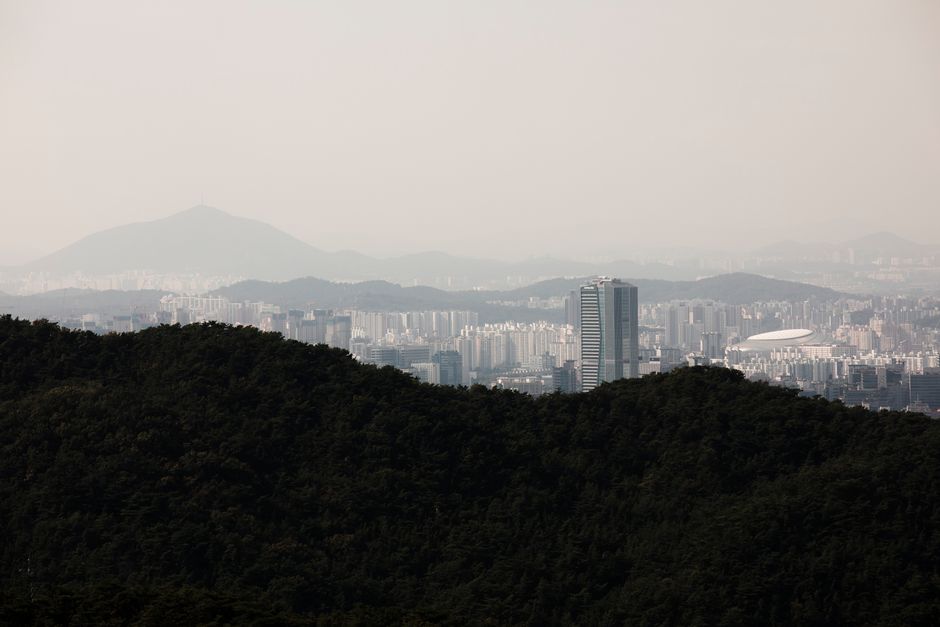 Modern Seoul skyline with Namsan Tower, representing a safe and exciting trip to South Korea