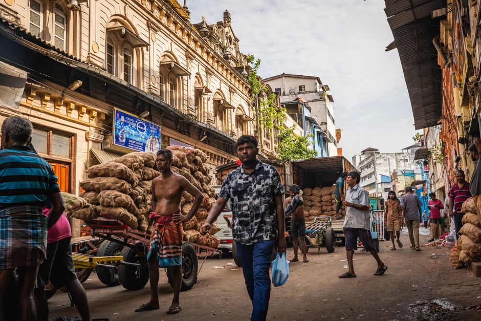 Vibrant spice market stall in Sri Lanka with colorful spices and local vendors