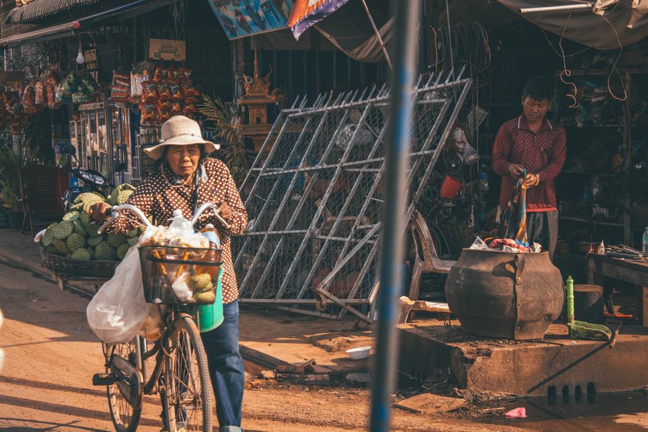 Vibrant street food market in Cambodia with various local dishes