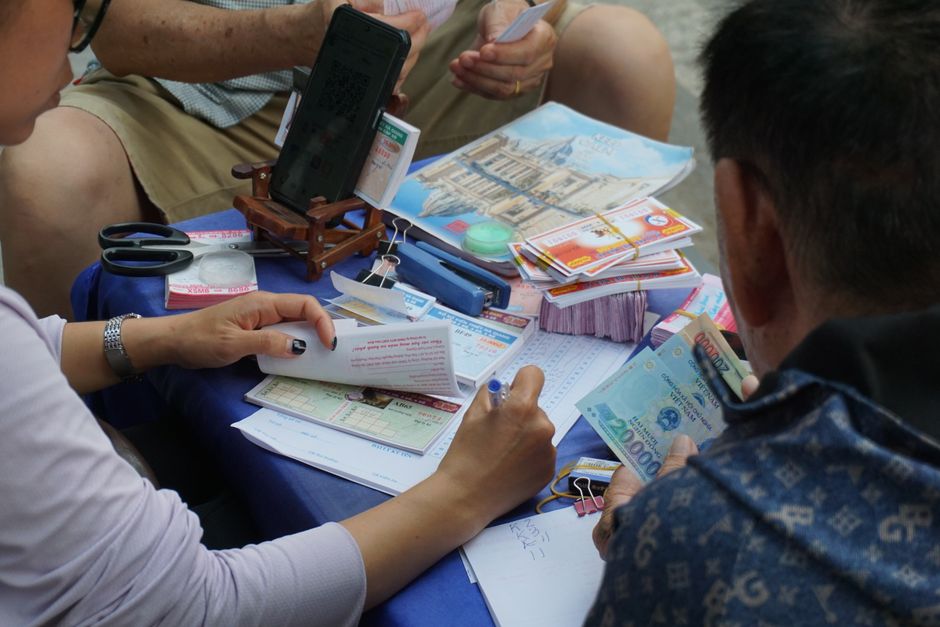Traveler purchasing a Smart Axiata SIM card at Phnom Penh International Airport, Cambodia