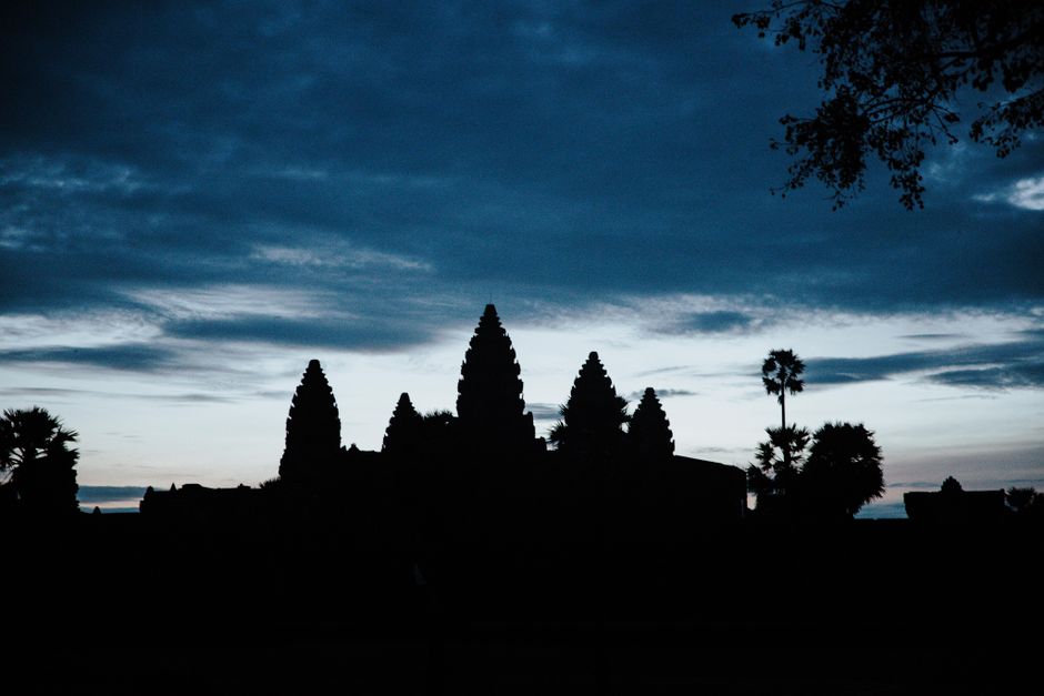 Sunrise over Angkor Wat temple in Siem Reap, Cambodia, a major tourist attraction.