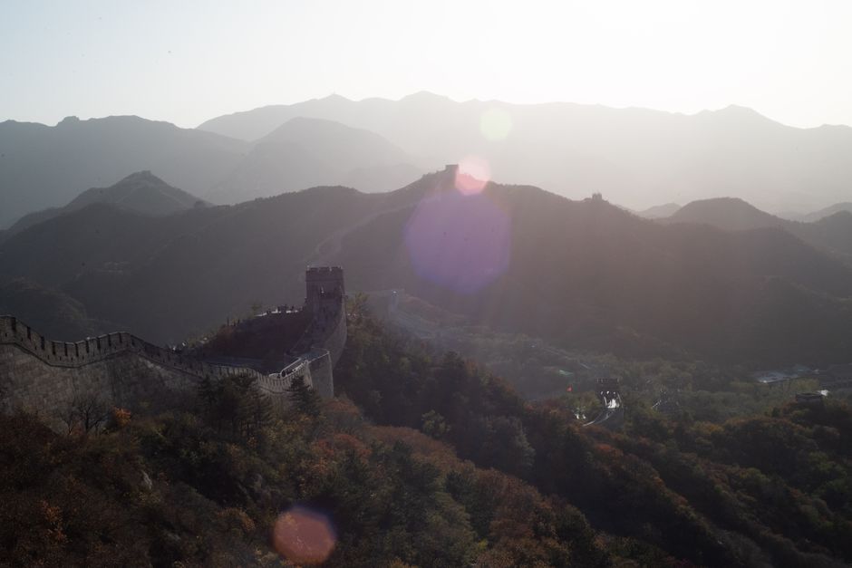 Sunset over the majestic Great Wall of China, symbolizing travel and adventure