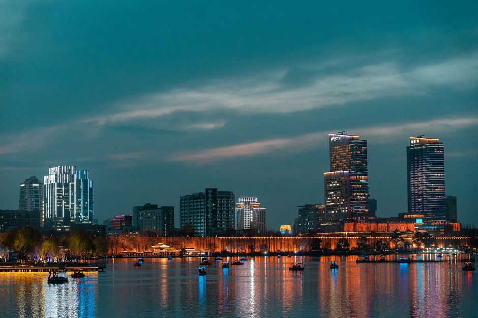 Vibrant modern China city skyline at night, symbolizing global internet connectivity