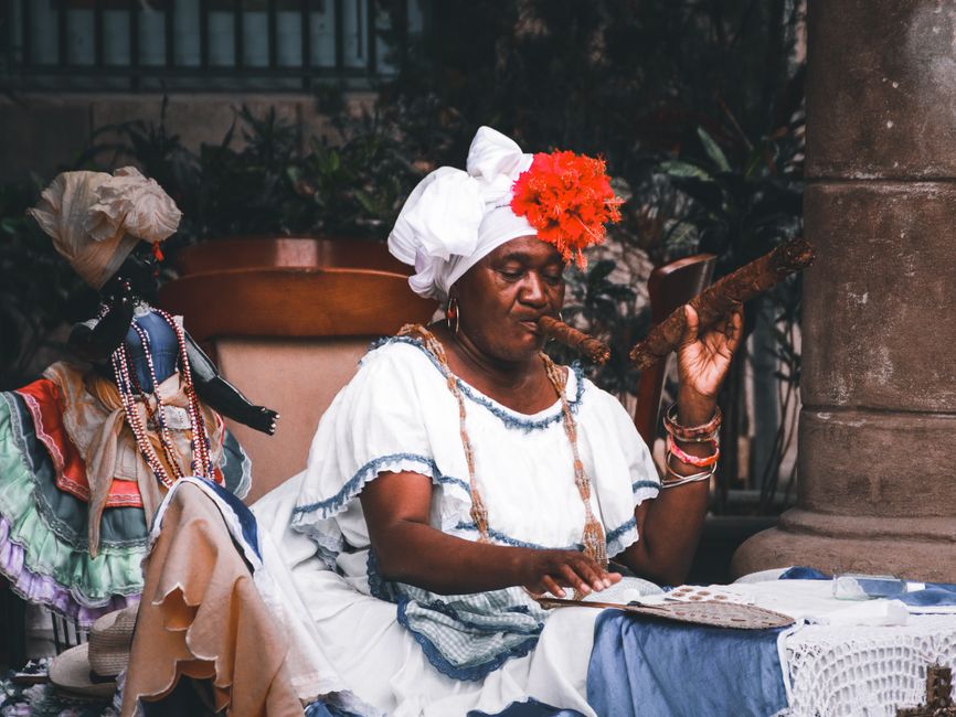Vibrant street food market in Havana, Cuba, with local vendors and colorful dishes.