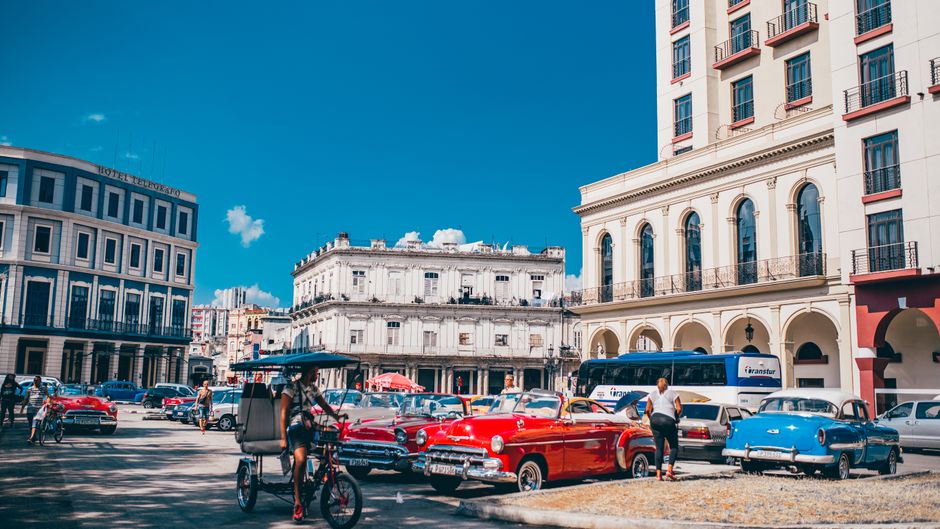 Travelers connecting to internet in a Havana park, Cuba