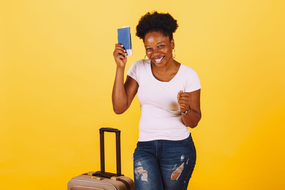Traveler purchasing a SIM card at an airport kiosk in Jamaica