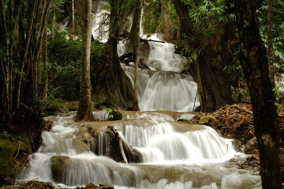 Tourists climbing Dunn's River Falls in Jamaica