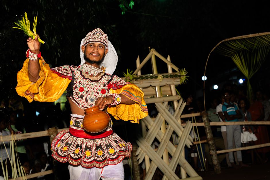 Maldivian Boduberu performers in traditional dress on a local island in Maldives
