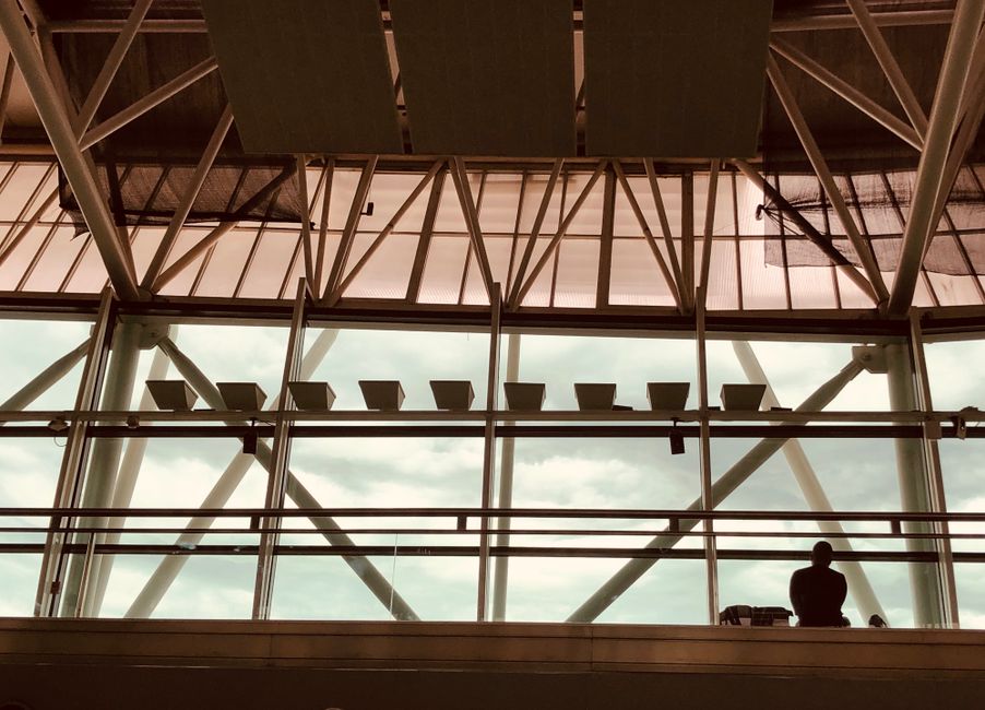Travelers purchasing SIM cards at Velana International Airport in Maldives