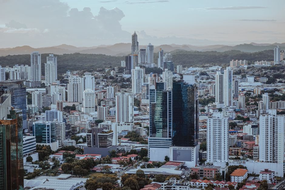 Vibrant Panama City skyline at sunset with modern buildings and ocean views