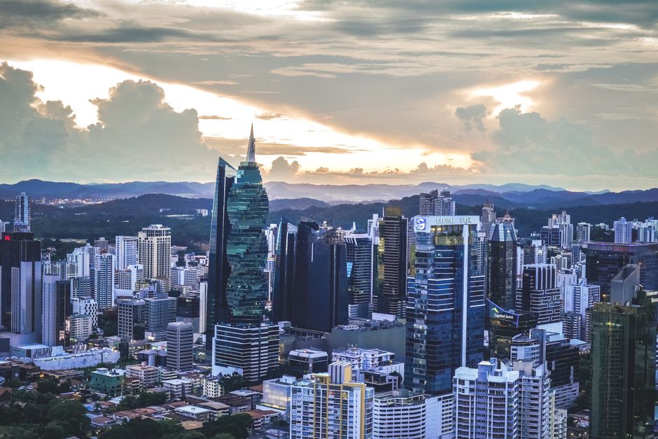 Panama City skyline with modern buildings and vibrant colors at dusk