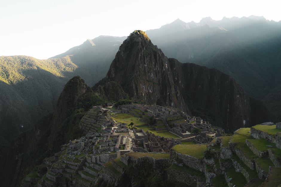 Panoramic view of Machu Picchu at sunrise in Peru, ancient Inca citadel