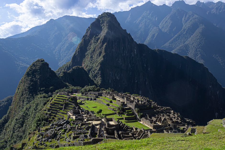 Panoramic view of Machu Picchu at sunrise in Peru, ancient Inca citadel