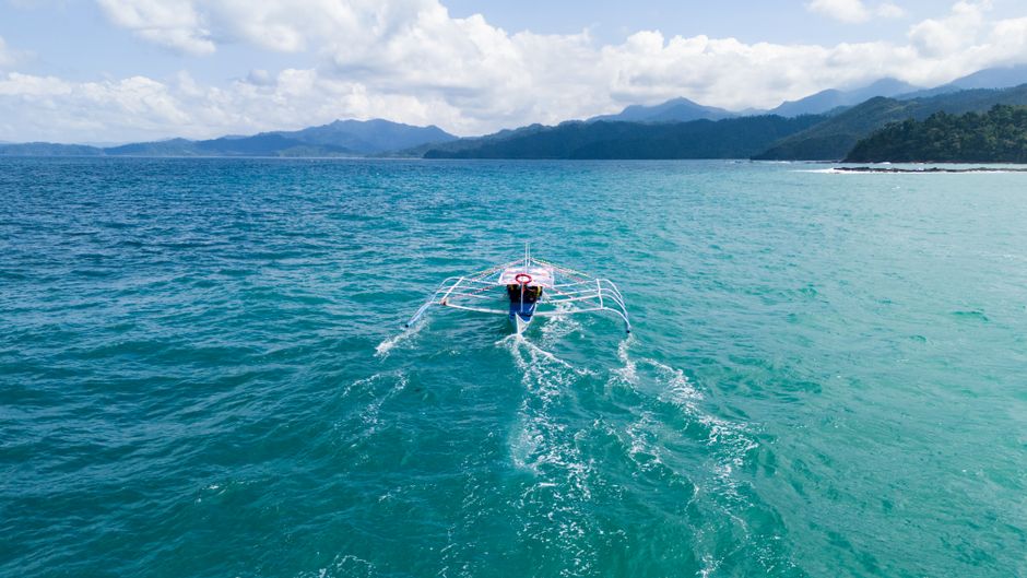 Aerial view of stunning Philippine islands and clear blue waters, showcasing regional beauty and diversity